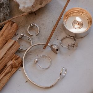 Natural incense sticks on a stone tray.